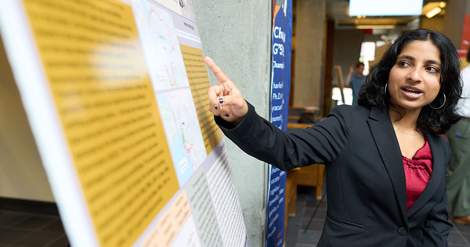 Undergraduate student presenting research at annual celebration of undergraduate scholarship