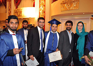 Six people shown at a college graduation