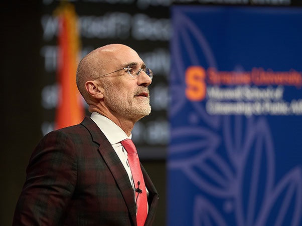 Arthur Brooks speaking at a centennial celebration event at the National Veterans Resource Center